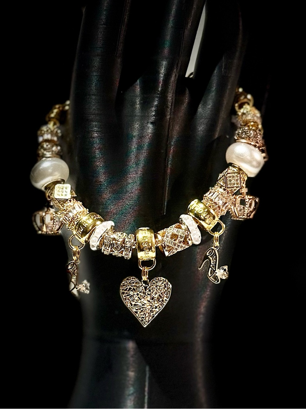 Elegant Gold and Silver Charm Bracelet